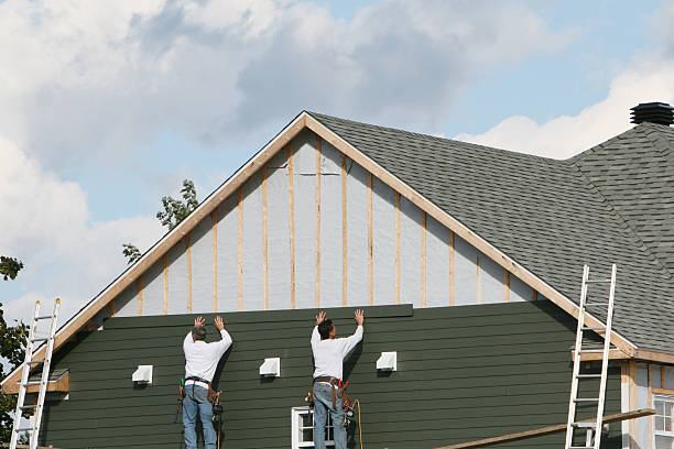 Professional Siding Replacement technician working in Essex, MD